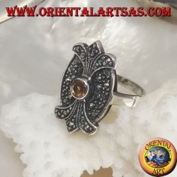 Silver ring with round yellow topaz on oval shield with double mirror lily studded with marcasite