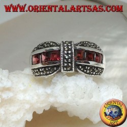 Silver bow tie ring with a row of square garnet and marcasite garnishes