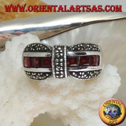 Silver bow tie ring with a row of square garnet and marcasite garnishes