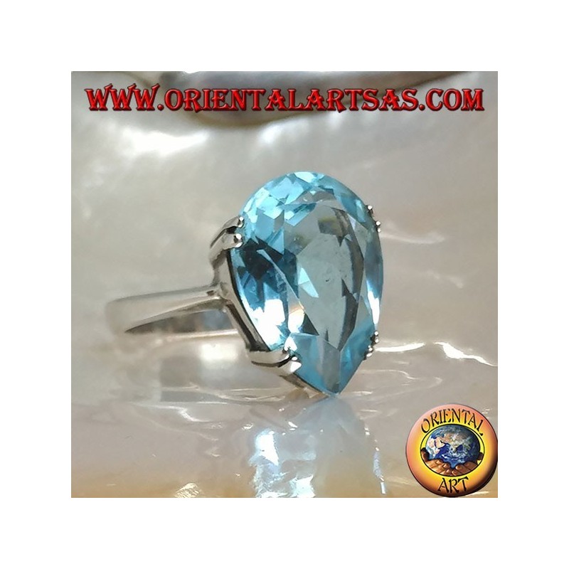 Bague en argent avec grande topaze goutte bleue sertie d'un serti griffe