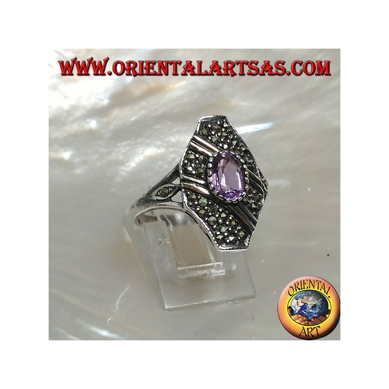 Silver ring with oval natural amethyst on an octagonal setting studded with marcasite and two oblique rows