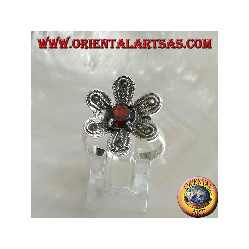 Silver ring in the shape of a flower "star of bethlehem" with round natural garnet and marcasite