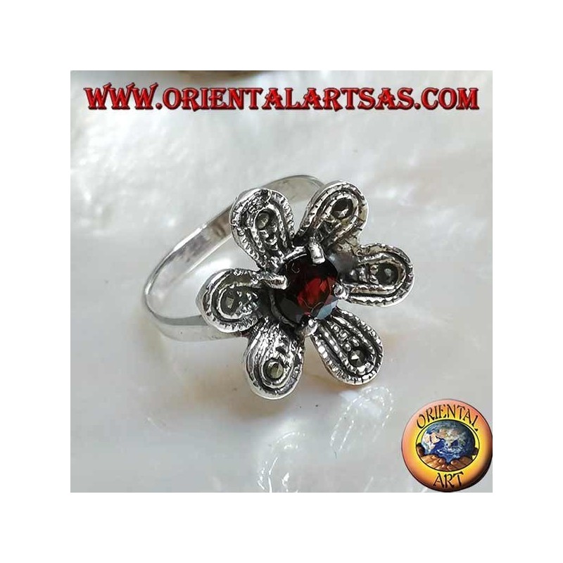 Silver ring in the shape of a flower "star of bethlehem" with round natural garnet and marcasite