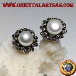 Lever-lock silver earrings with freshwater pearl surrounded by two alternating lines of marcasite