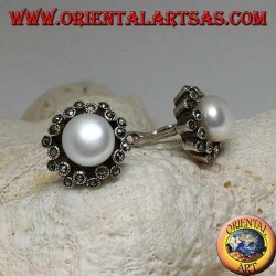 Lever-lock silver earrings with freshwater pearl surrounded by two alternating lines of marcasite