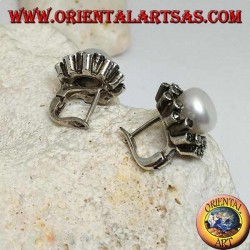 Lever-lock silver earrings with freshwater pearl surrounded by two alternating lines of marcasite