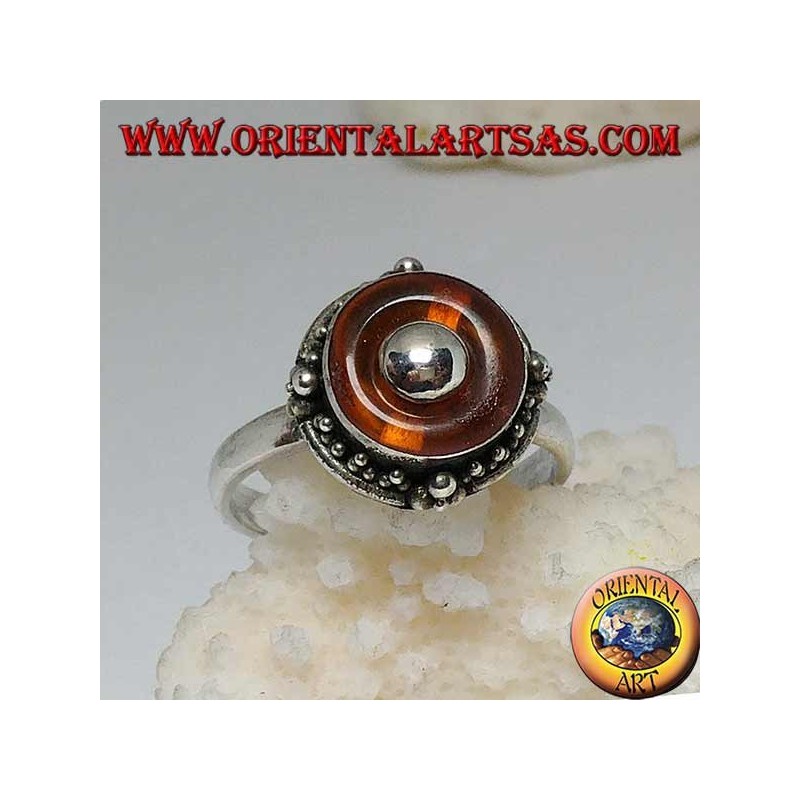 Silver ring with natural amber disc and central ball