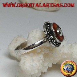 Bague en argent avec disque d'ambre naturel et boule centrale