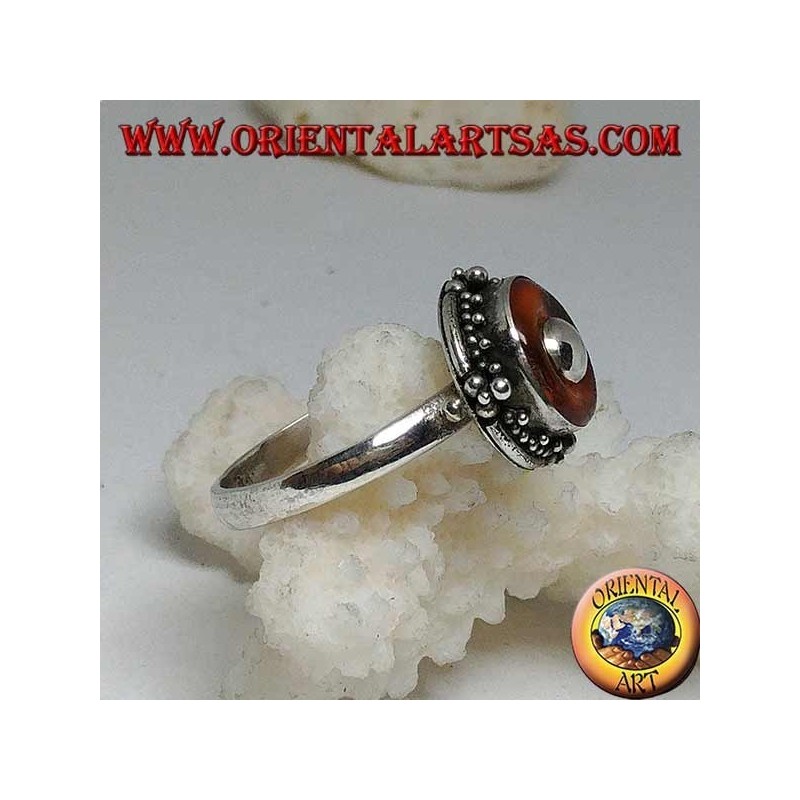 Silver ring with natural amber disc and central ball