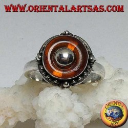 Bague en argent avec disque d'ambre naturel et boule centrale