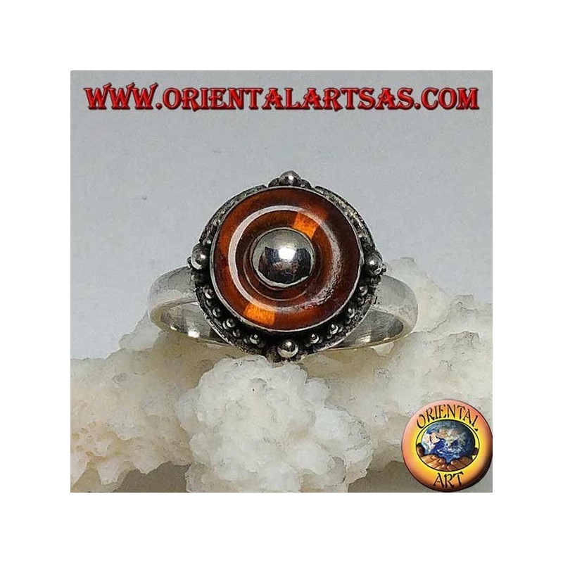 Anello in argento con dischetto in ambra naturale e pallina centrale