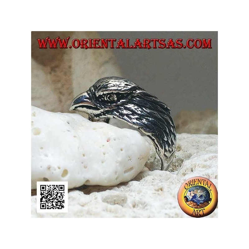 Anello in argento testa di aquila beccante a tre quarti