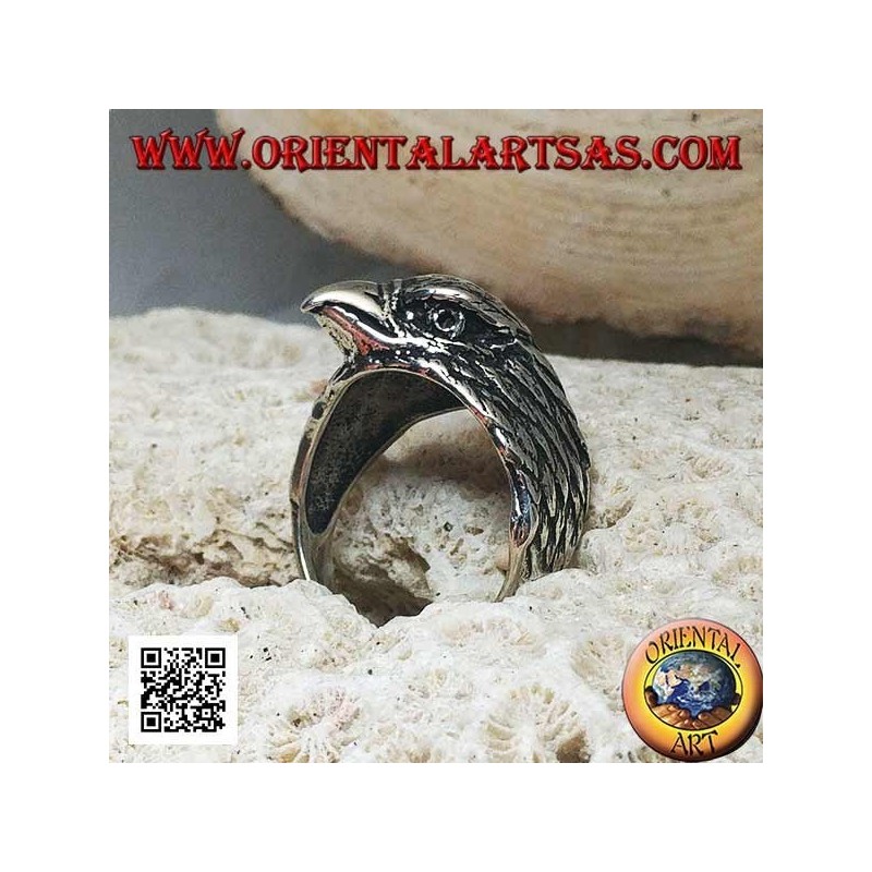 Silver ring with three-quarter pecking eagle head
