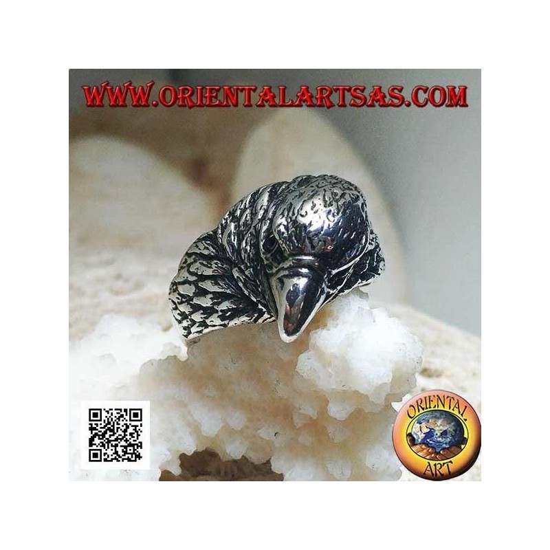 Silver ring with three-quarter pecking eagle head