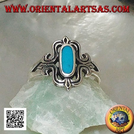 Silver ring with oval turquoise elongated in a stylized rectangle