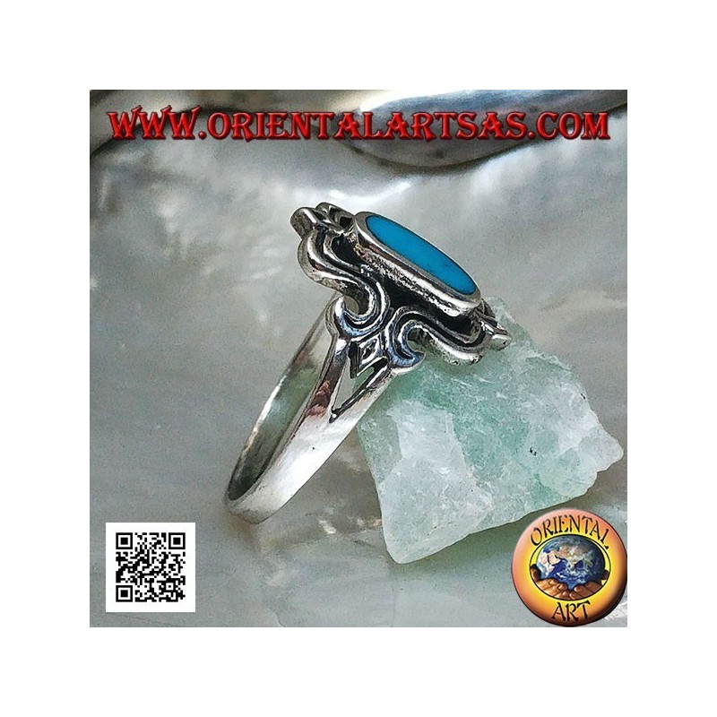 Bague en argent avec turquoise ovale allongée dans un rectangle stylisé