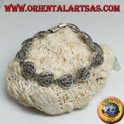 Silver bracelet with 11 openwork hearts with two wavy lines studded with marcasite