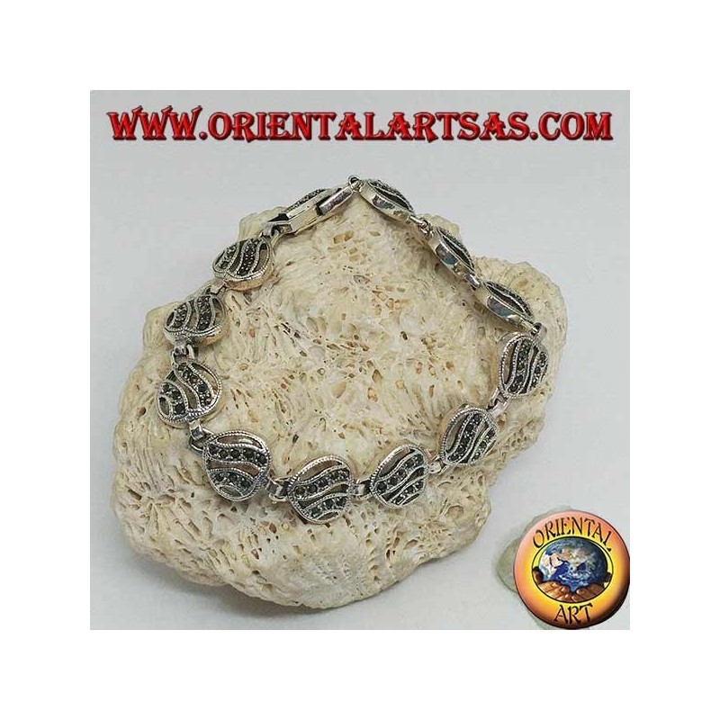 Bracciale in argento con 11 cuori traforati con due linee ondulate tempestati di marcassite