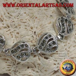 Pulsera de plata con 11 corazones calados con dos líneas onduladas tachonadas con marcasita