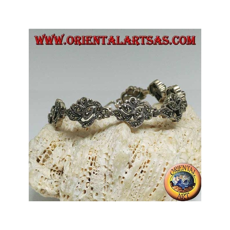 Silberarmband mit 9 ineinander verschlungenen Blättern mit Markasit besetzt