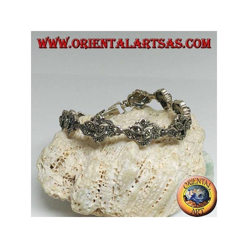 Silberarmband mit 9 ineinander verschlungenen Blättern mit Markasit besetzt