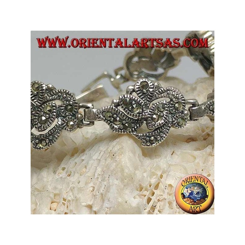 Silver bracelet with 9 intertwining of leaves studded with marcasite