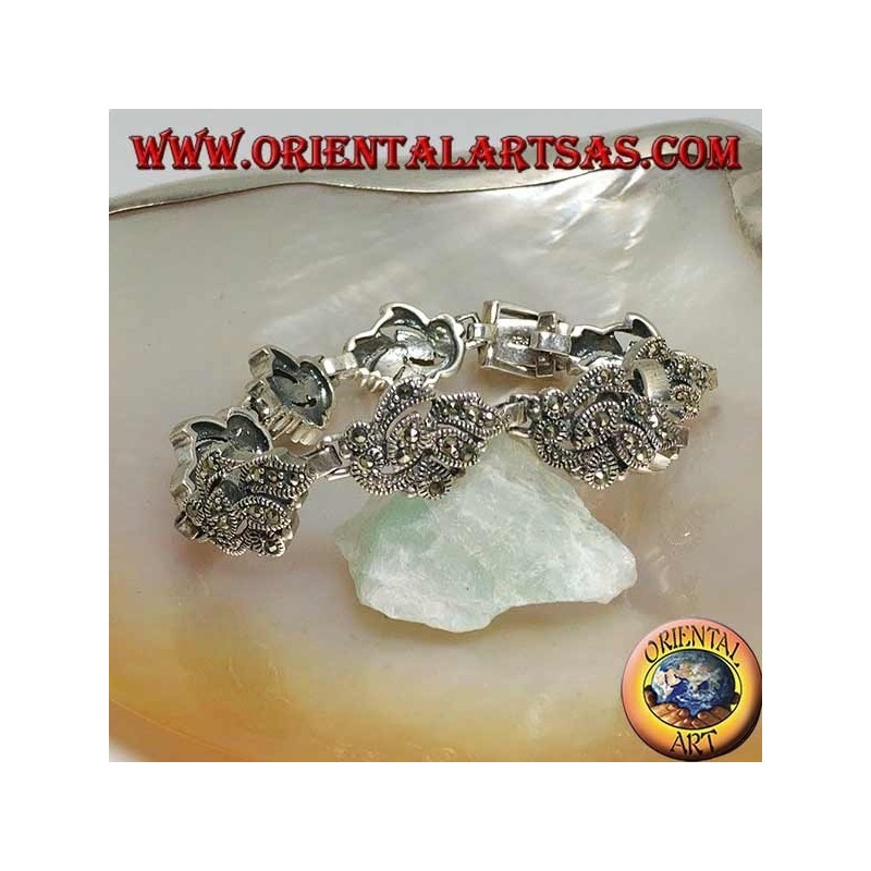 Silberarmband mit 9 ineinander verschlungenen Blättern mit Markasit besetzt