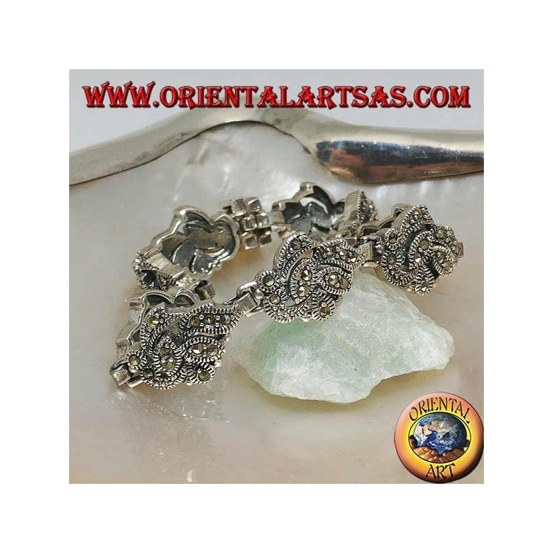 Silver bracelet with 9 intertwining of leaves studded with marcasite
