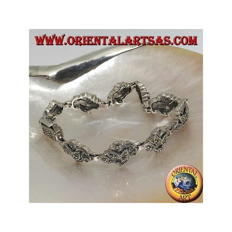 Silberarmband mit 9 ineinander verschlungenen Blättern mit Markasit besetzt
