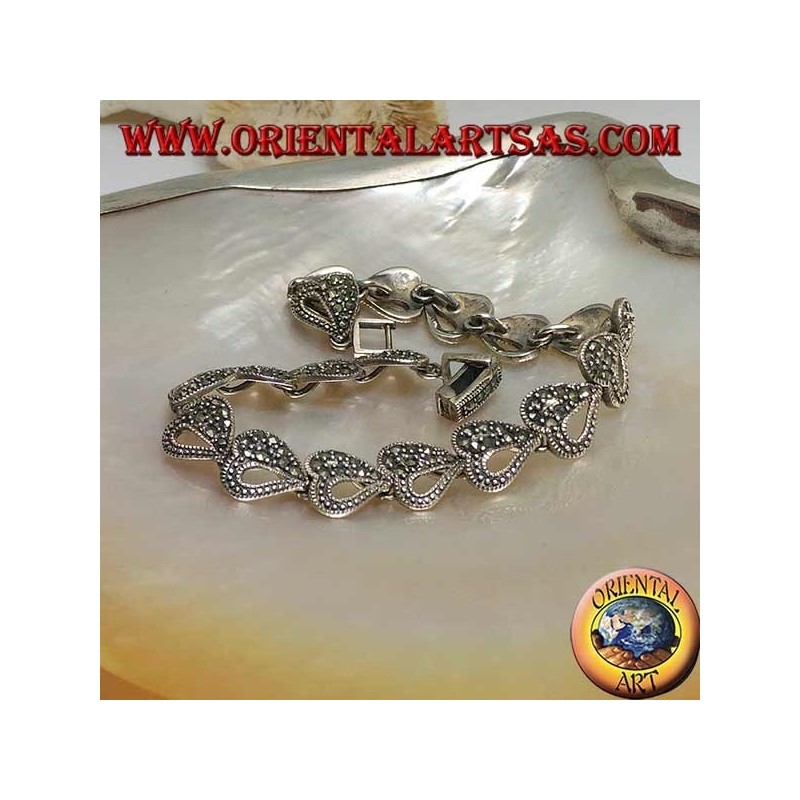 Bracelet en argent avec 18 coeurs mi-percés et mi-cloutés de marcassite