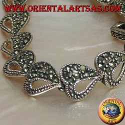 Bracelet en argent avec 18 coeurs mi-percés et mi-cloutés de marcassite