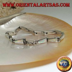 Silver bracelet with 13 isosceles trapezoids elongated in harlequin opal