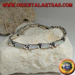 Silver bracelet with 13 isosceles trapezoids elongated in harlequin opal