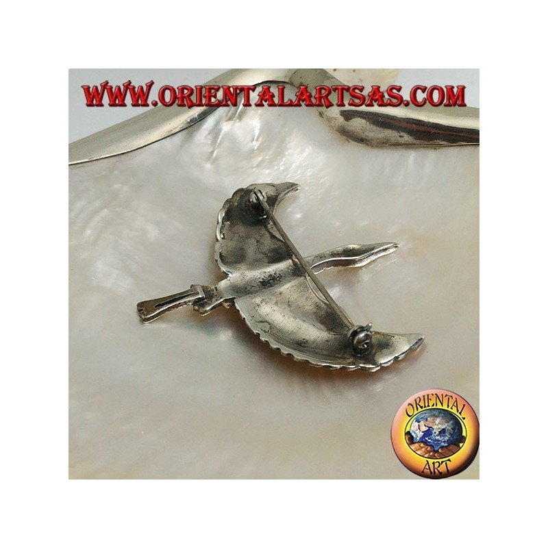 Silver brooch in the shape of an albatross (diomedeidae) in flight with spread wings studded with marcasite
