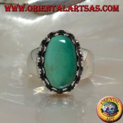 Silver ring with natural Tibetan antique oval turquoise set with discs with lateral weave