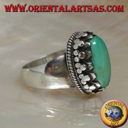 Silver ring with natural Tibetan antique oval turquoise set with discs with lateral weave