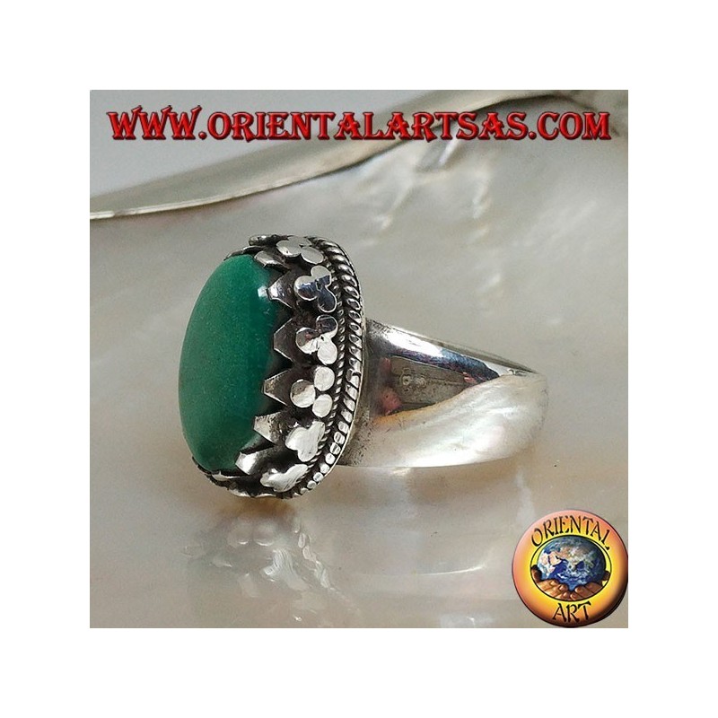 Silver ring with natural Tibetan antique oval turquoise set with discs with lateral weave