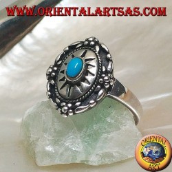 Shield silver ring decorated with central oval turquoise on engraved sun and flowers on the edge
