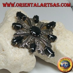 Silver brooch with Celtic cross studded with marcasite surrounded by shuttle onyxes and a central round