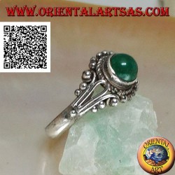 Silver ring with round green cabochon agate surrounded by interweaving and balls decoration