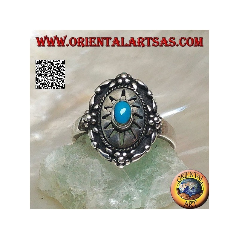 Shield silver ring decorated with central oval turquoise on engraved sun and flowers on the edge
