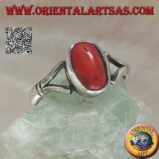 Silver ring with oval Tibetan antique coral hooked by two wires on a simple setting
