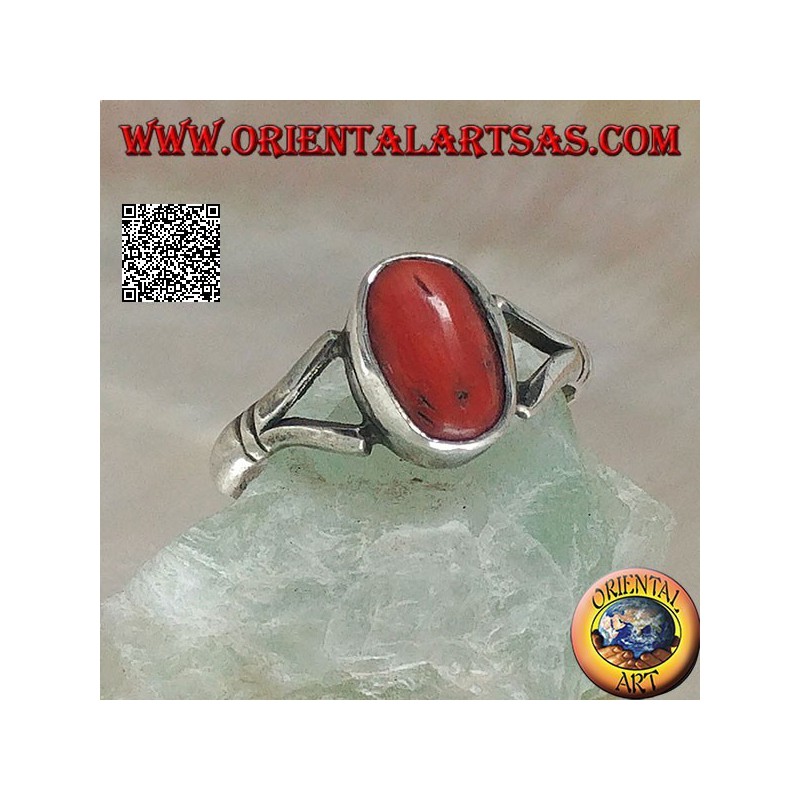 Silver ring with oval Tibetan antique coral hooked by two wires on a simple setting