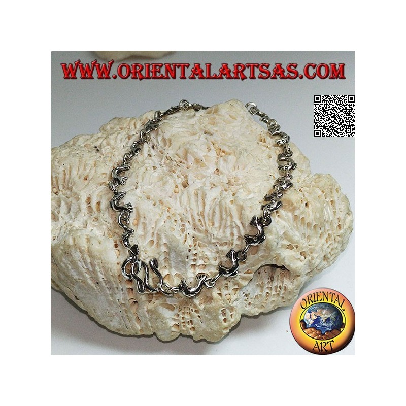 Bracciale in argento morbido con fila di delfini in salto