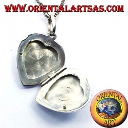 Photo pendentif porte-coeur incrusté d'argent