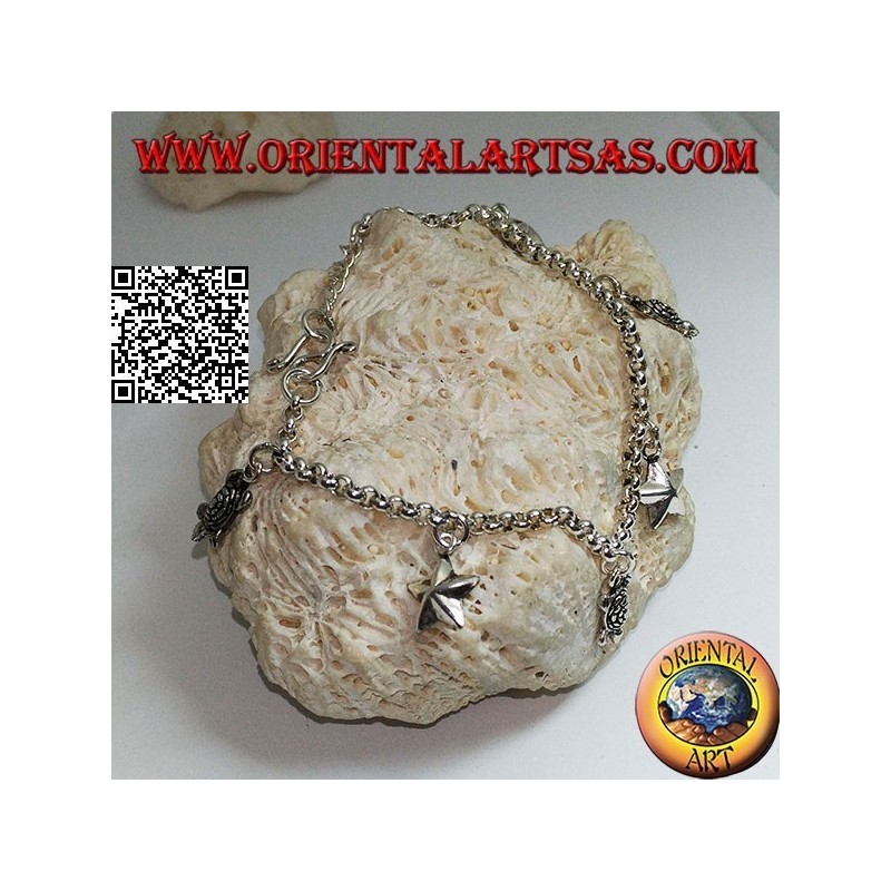 Bracciale in argento morbido a catena con stelle e tartarughe appese