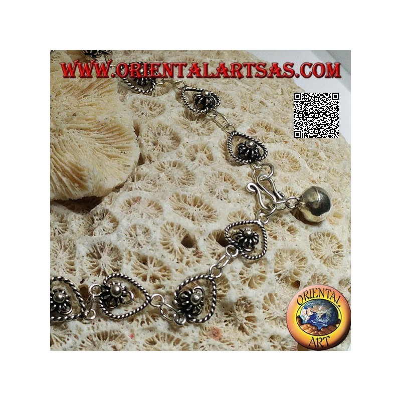 Soft silver bracelet with chain of flowers in the drop and final bell