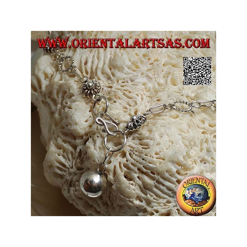 Soft silver bracelet with flowers and alternating circles and final bell