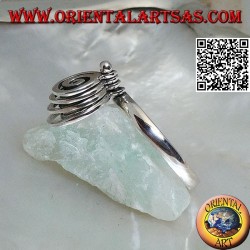 Silver ring with 4 rotating growing spirals
