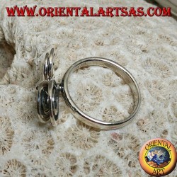 Anillo de plata con 4 espirales giratorias en crecimiento.